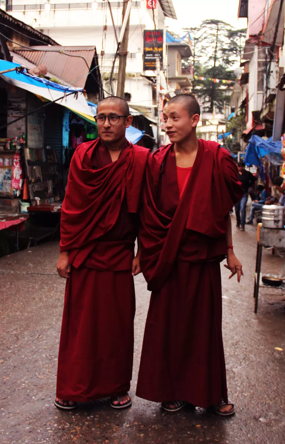 Photo of Monks shying away. Main Square, Mcleodganj by Oindrilla Gupta