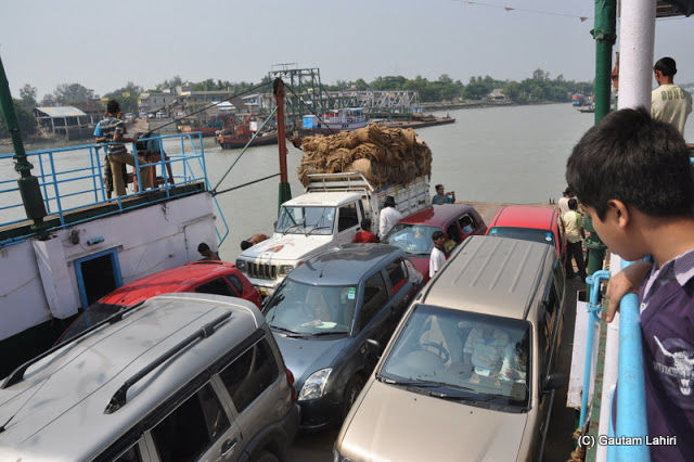 Photo of Bakkhali, oneness of river, sand and sea under the crimson sun by Gautam Lahiri