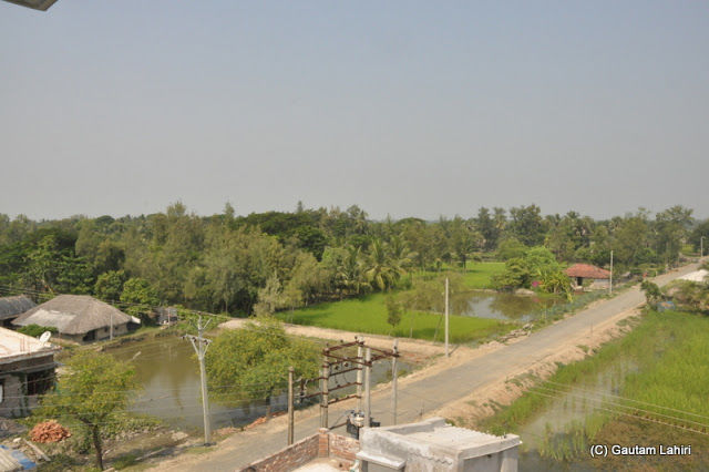 Photo of Bakkhali, oneness of river, sand and sea under the crimson sun by Gautam Lahiri