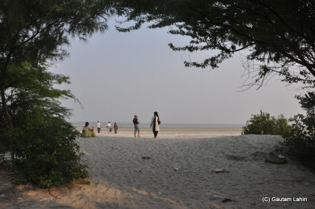 Photo of Bakkhali, oneness of river, sand and sea under the crimson sun by Gautam Lahiri