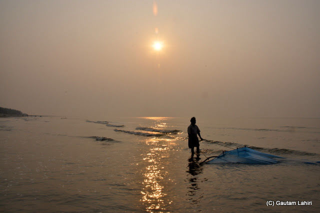 Photo of Bakkhali, oneness of river, sand and sea under the crimson sun by Gautam Lahiri