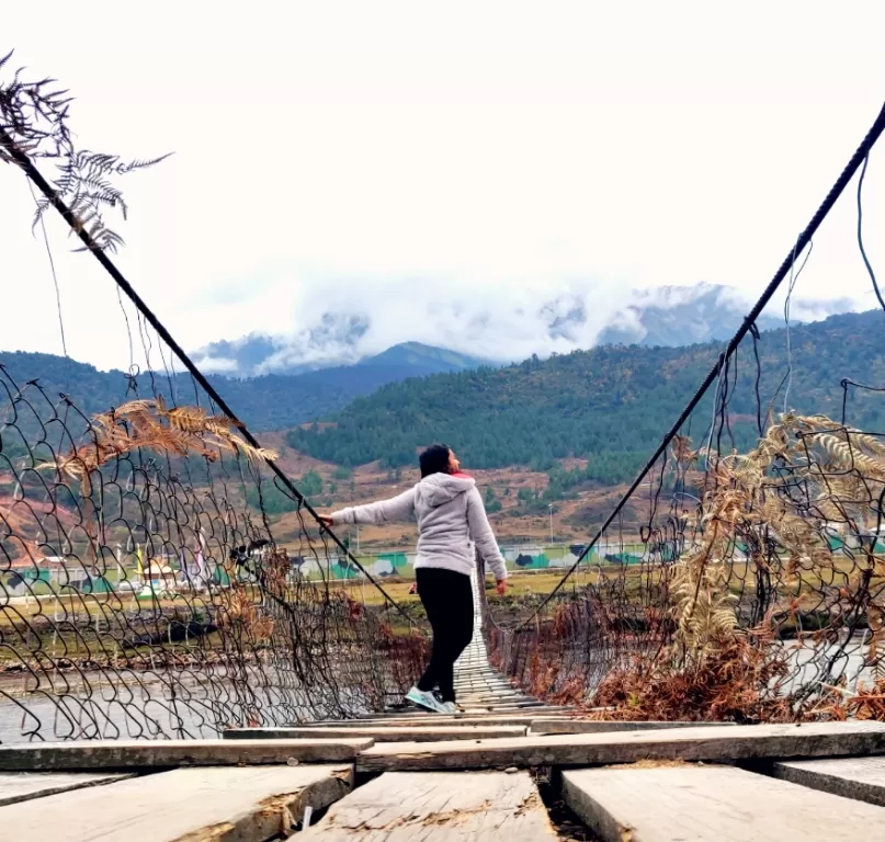 Photo of Clouds over the Hanging Bridge #Lockdown #BackToTheMountains #Menchuka #ArunachalPradesh by Akanksha Dadhich