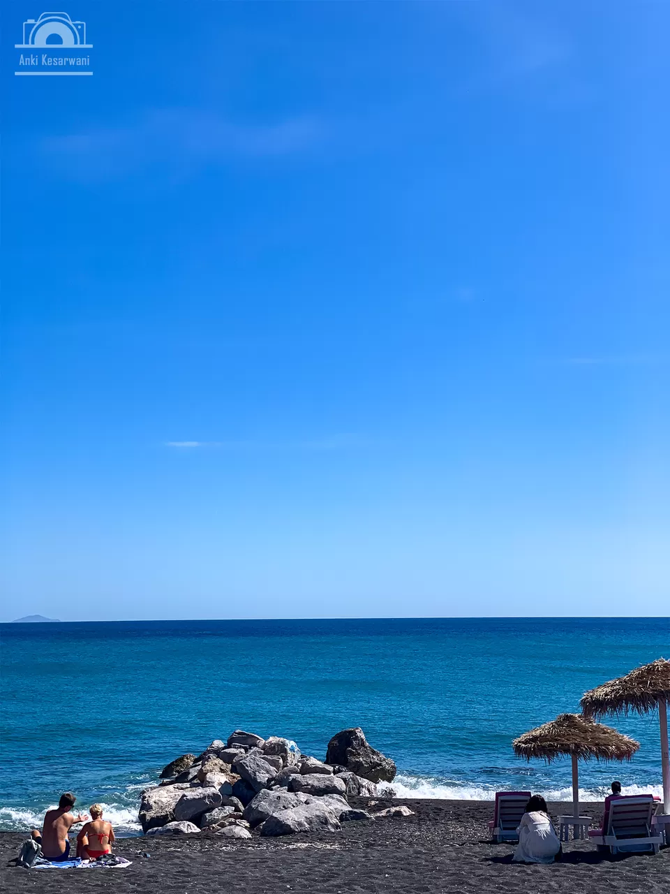 Photo of Perissa Beach, Santorini, Greece by Wanderwithanki
