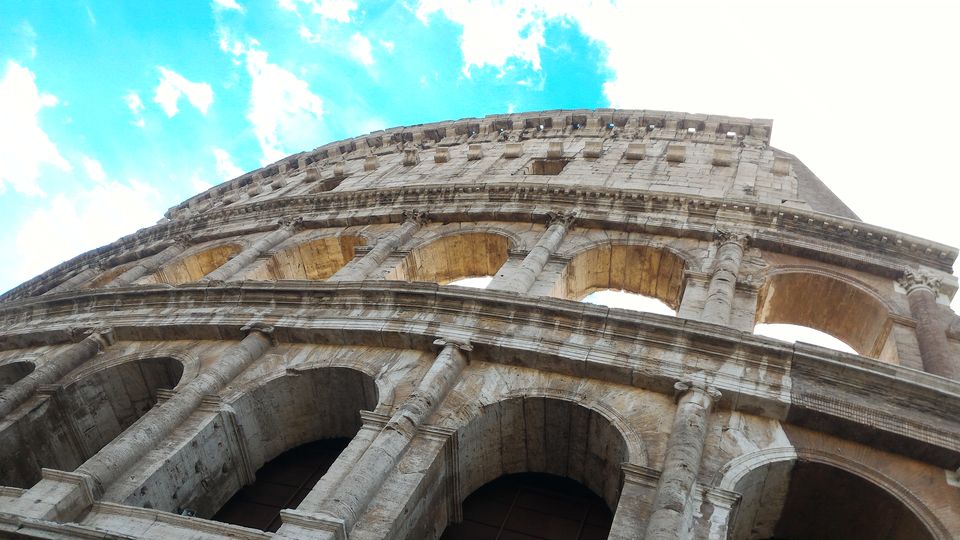 Photo of Colosseum, Piazza del Colosseo, Rome, Metropolitan City of Rome, Italy by Rohith Girish
