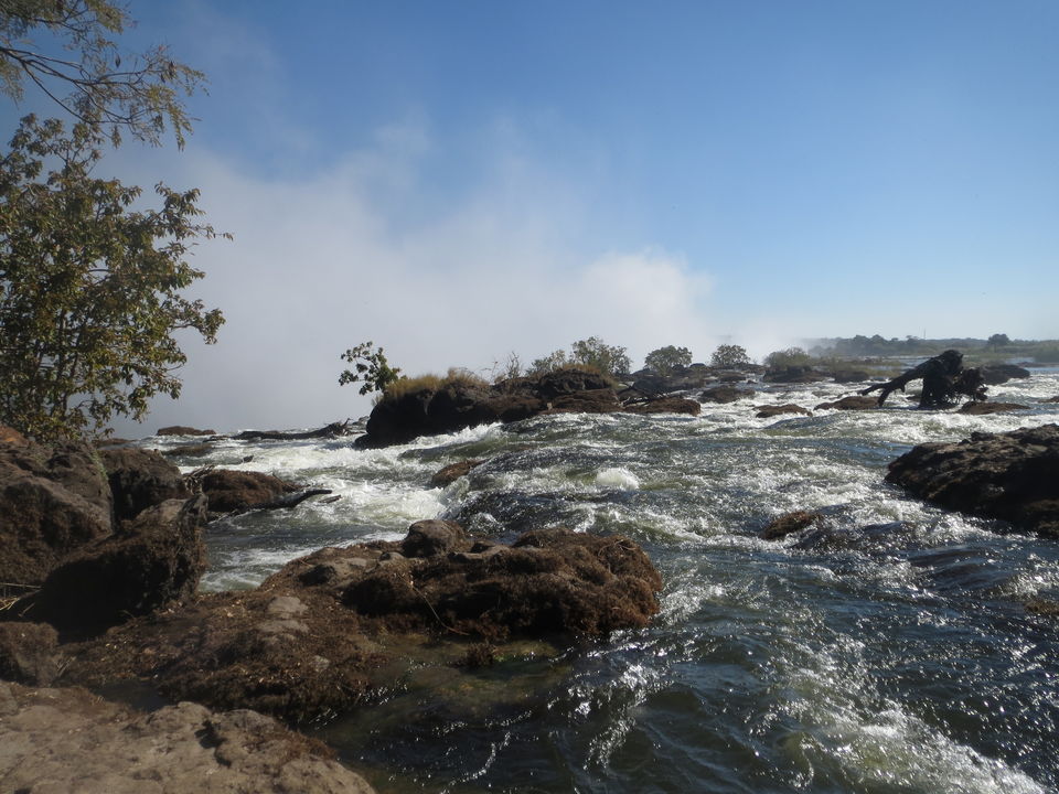 Photo of This Is The World's Largest Waterfall And Getting Here Is More Affordable Than You Think by Caitlin Graaf