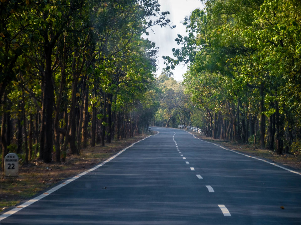 Photo of Massanjore: Beautiful road and a broken Omni car 1/1 by Sourav Halder