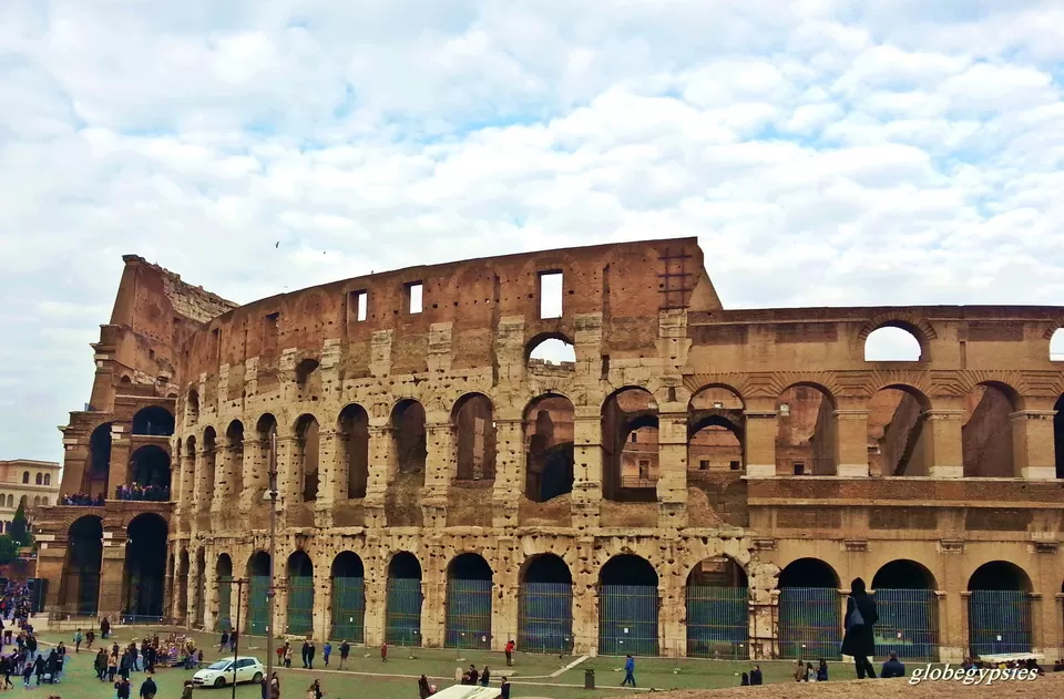 Photo of Romes Colosseum, Rome, Metropolitan City of Rome, Italy by Panchami Bekal