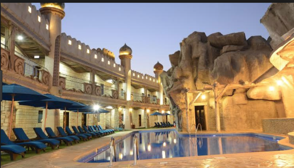 Photo of Watch Giraffes, zebras, ostriches and other animals from your Hotel room in this luxury hotel by vidhi bubna