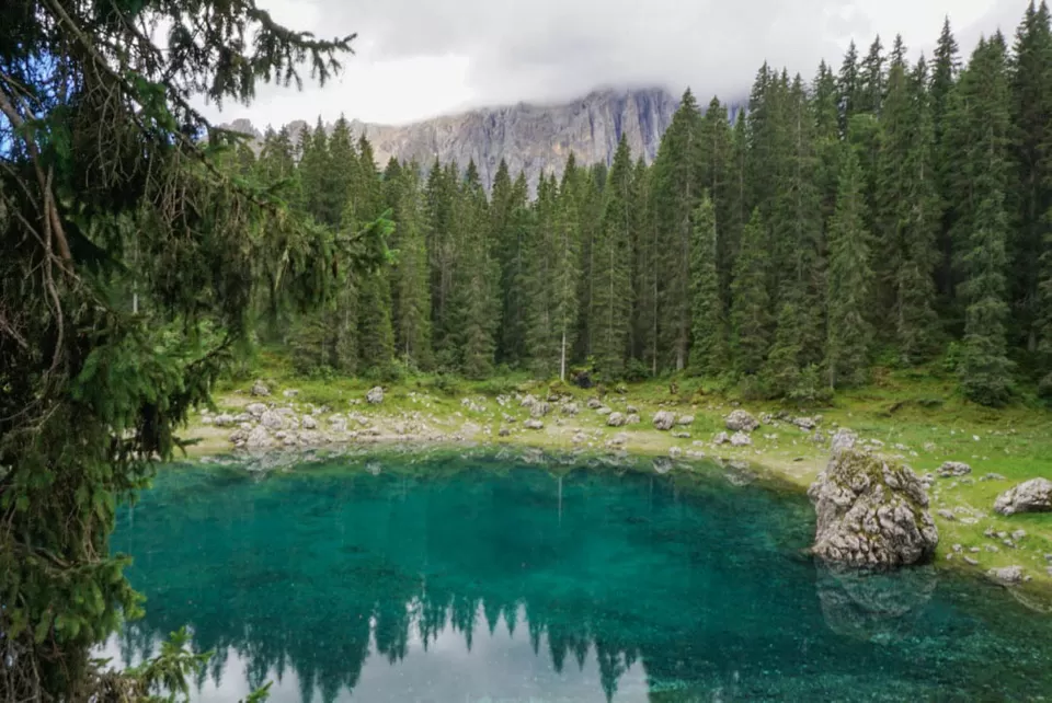 Photo of Lago di Carezza, Welschnofen, Province of Bolzano - South Tyrol, Italy by Katie McIntosh