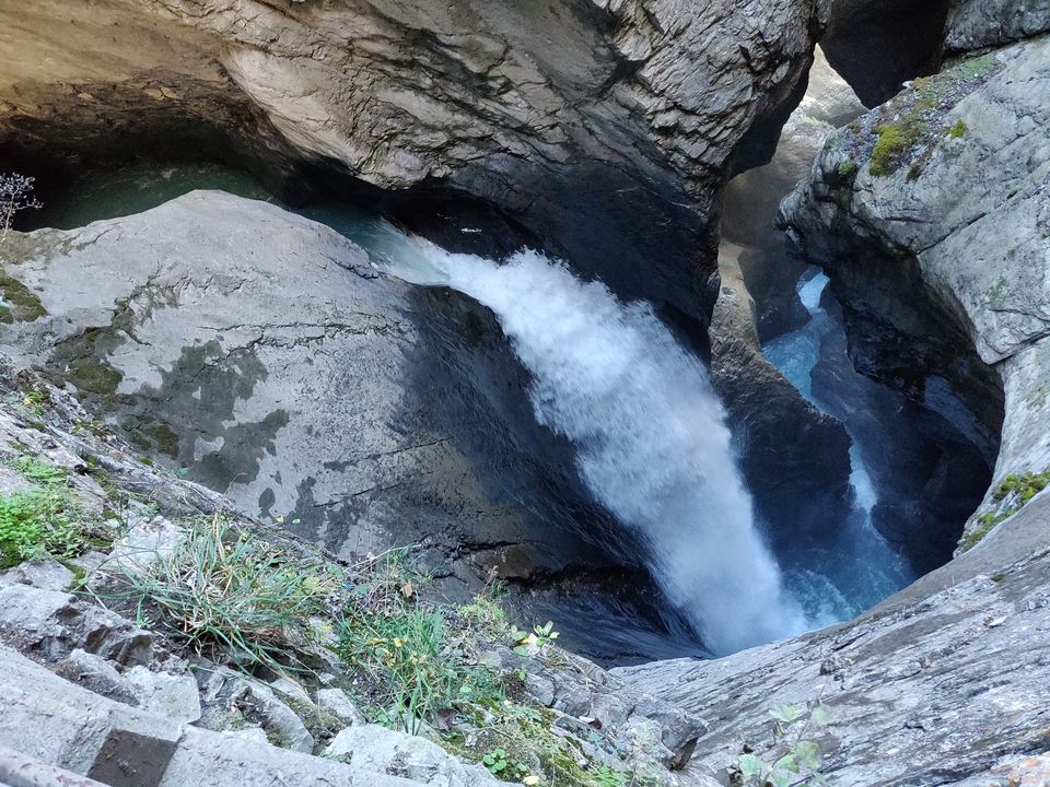 Photo of Trummelbach waterfalls under the caves in Switzerland by Pooja Agarwal