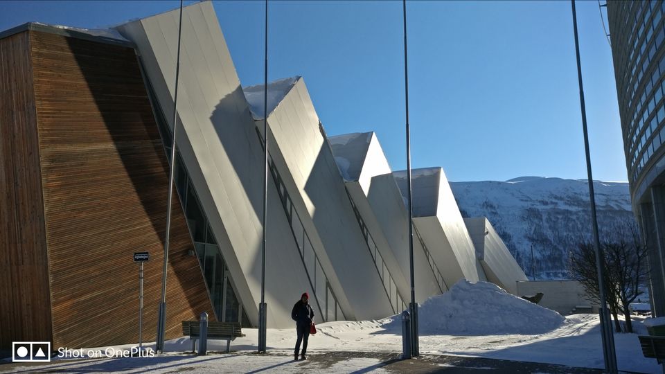 Photo of Tromso's arctic twins- Polaria and Cathedral by Rwittick Dutta