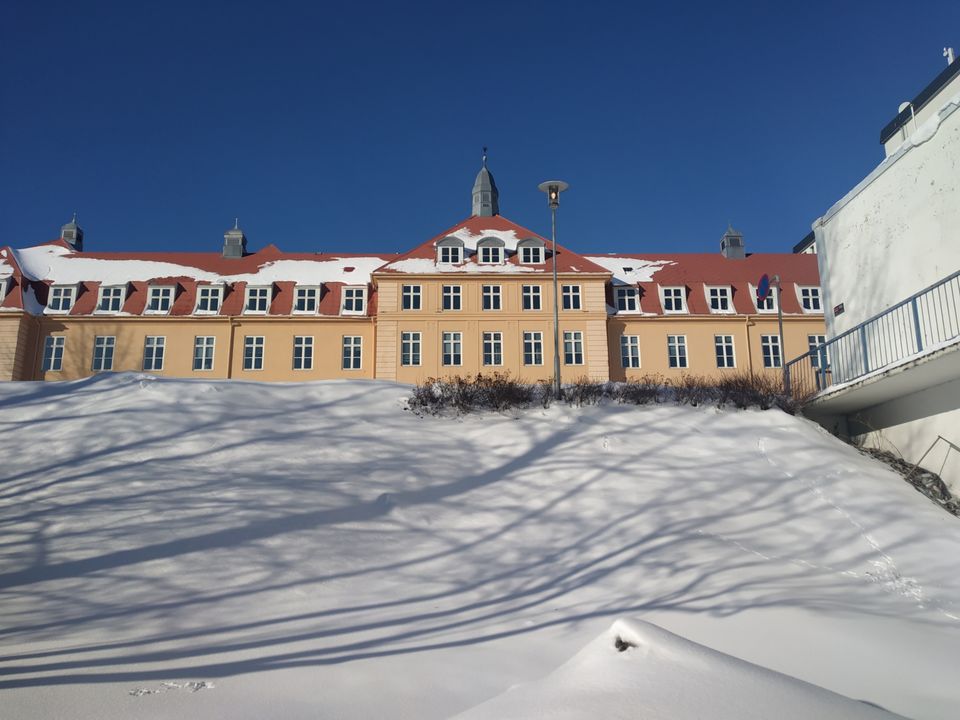 Photo of Tromso's arctic twins- Polaria and Cathedral by Rwittick Dutta