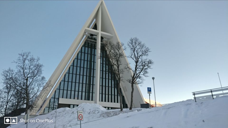 Photo of Tromso's arctic twins- Polaria and Cathedral by Rwittick Dutta