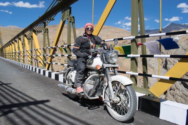 Photo of 19-Year-Old Girl Conquers Khardung La Pass On Her Royal Enfield 1/4 by Priya Pareek