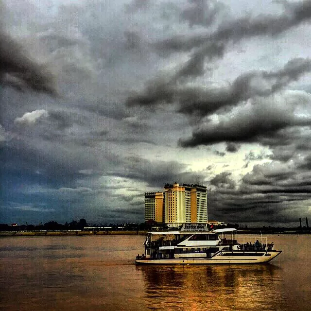 Photo of Walk Road Riverside, Phnom Penh, Cambodia by Brokedudetraveling