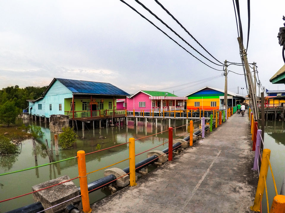Photo of Pulau Ketam - Cycling on Paved Roads Held Up by Stilts by Tara Anne Nikezic