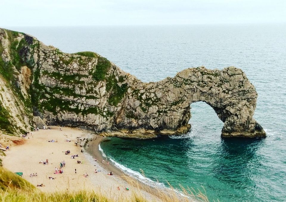 Photo of A first English summer at first natural UNESCO World Heritage site at Durdle Door, England. by Amyth Singh