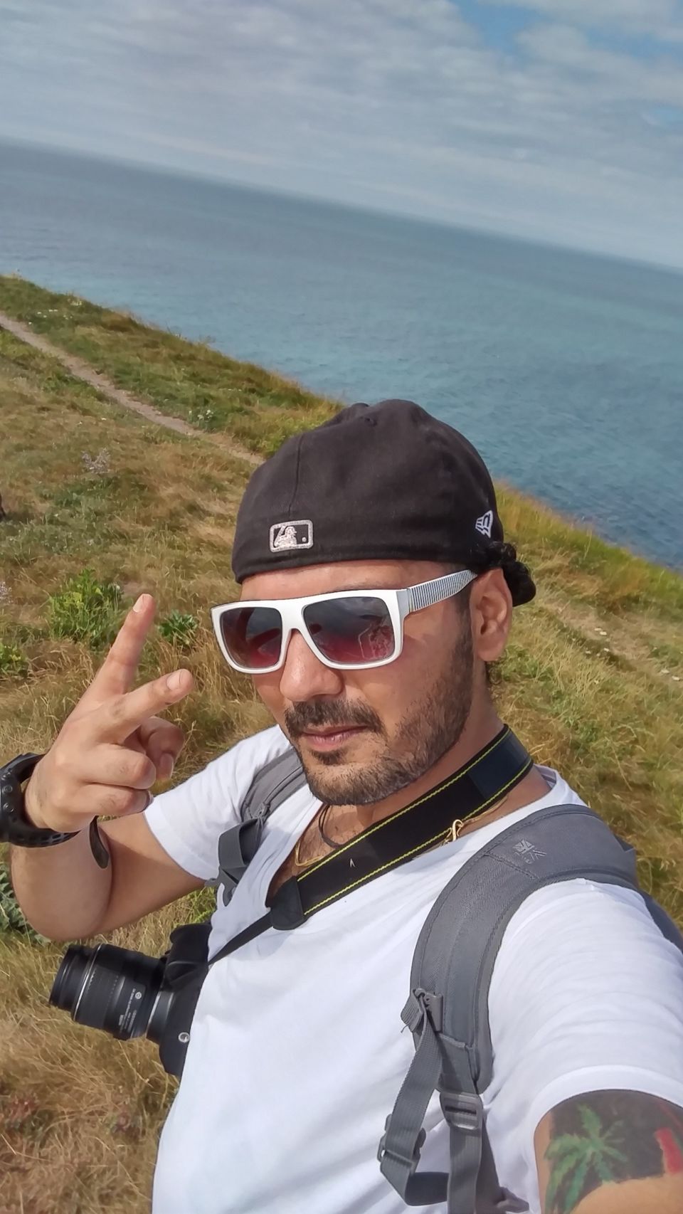 Photo of A first English summer at first natural UNESCO World Heritage site at Durdle Door, England. by Amyth Singh
