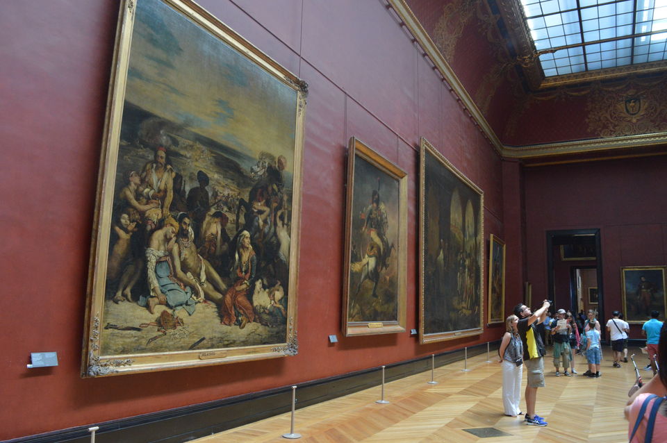 Photo of Louvre Museum, Rue de Rivoli, Paris, France by Hardik Khandelwal