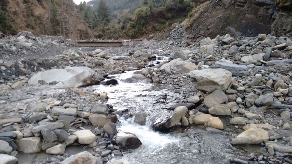 Photo of melted snow flowing down from mountains by Jai Prateek
