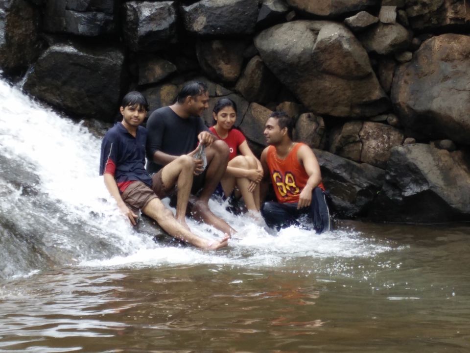 Photo of Enjoying the Waterfall by Whosane Tinwala