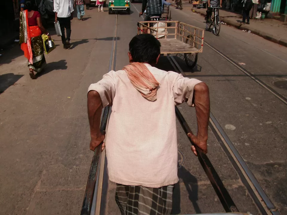 Photo of The famous hand-drawn rickshawpullers of kolkata by Debashree Roy