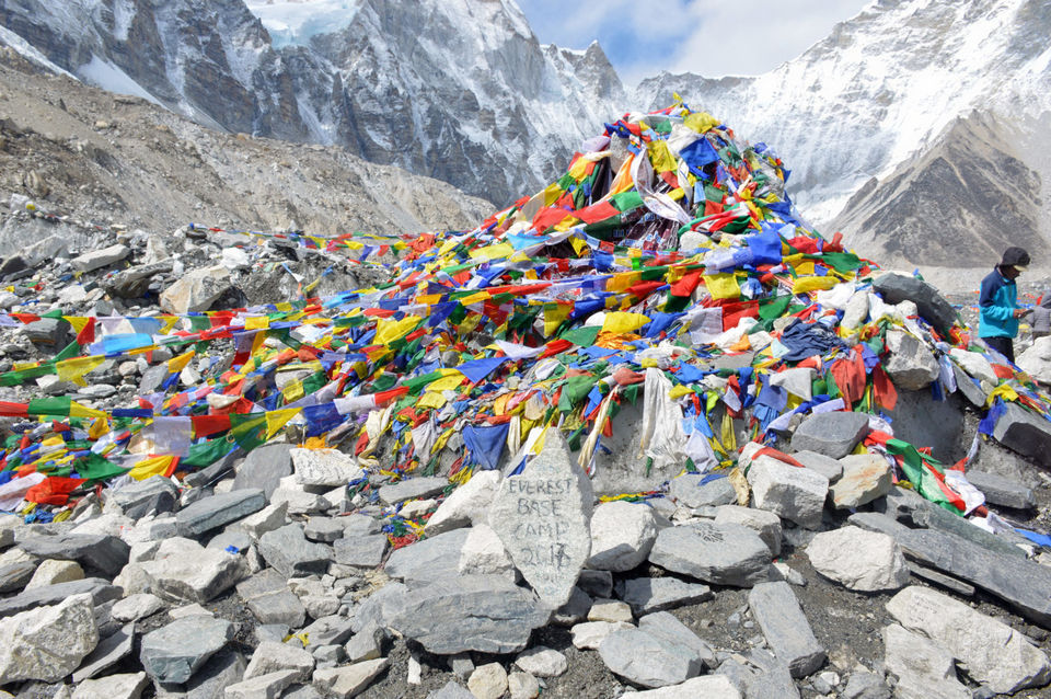 Photo of Everest Base Camp: Peeking through the clouds is the tip of a humongous experience called #Everest 1/5 by Anushri Pawar