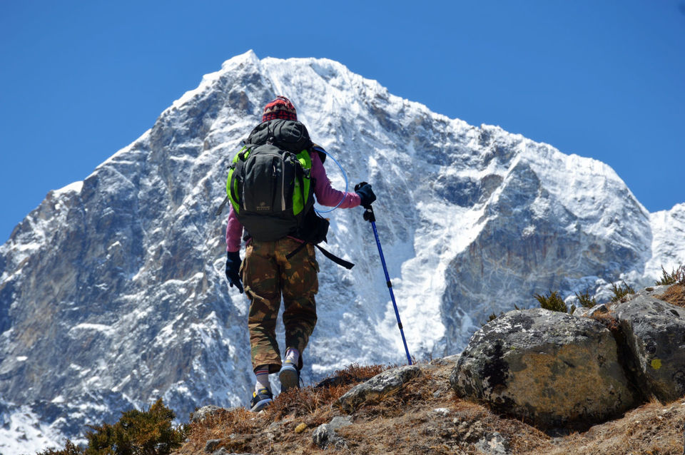 Photo of Everest Base Camp: Peeking through the clouds is the tip of a humongous experience called #Everest 2/5 by Anushri Pawar