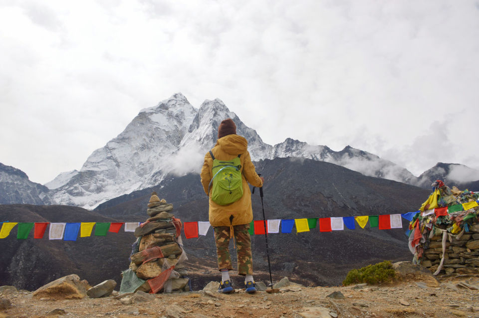Photo of Everest Base Camp: Peeking through the clouds is the tip of a humongous experience called #Everest 3/5 by Anushri Pawar