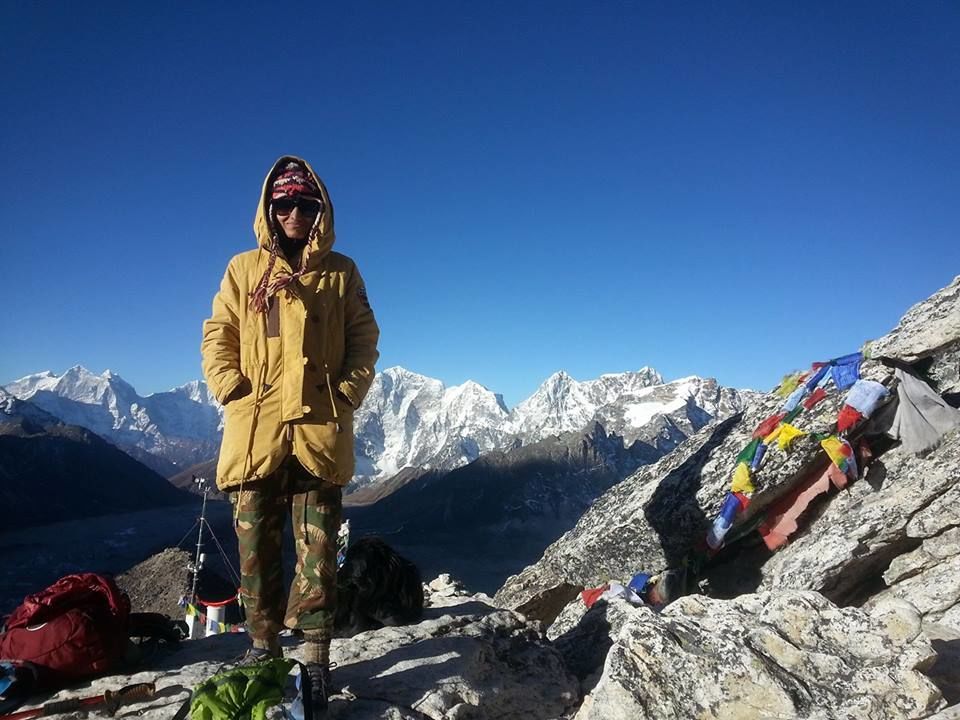 Photo of Everest Base Camp: Peeking through the clouds is the tip of a humongous experience called #Everest 4/5 by Anushri Pawar