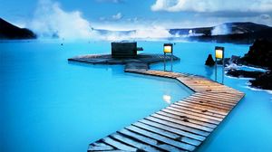Blue Lagoon Amidst Snow & Mountains