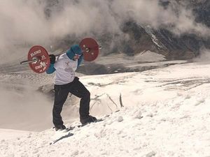 Man of steel: Russian climbs Mount Elbrus with 75 kg barbell on his back