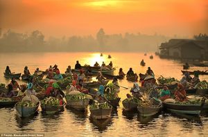 The floating markets of Indonesia with long lines of as many as 20 boats!