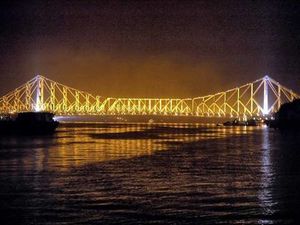 The Rabindra Setu (Howrah Bridge).
