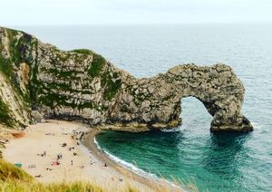 A first English summer at first natural UNESCO World Heritage site at Durdle Door, England.