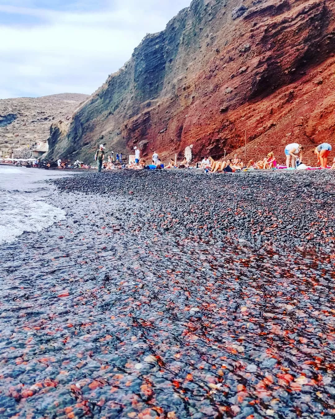 Photo of Red beach By The Travelling Chhori
