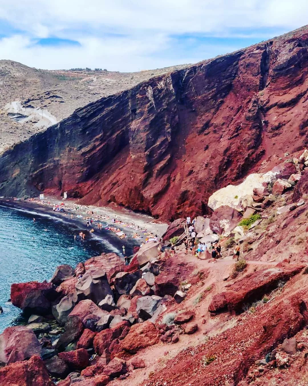 Photo of Red beach By The Travelling Chhori