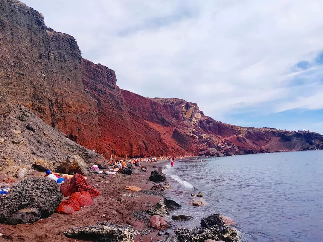 Photo of Red beach By The Travelling Chhori