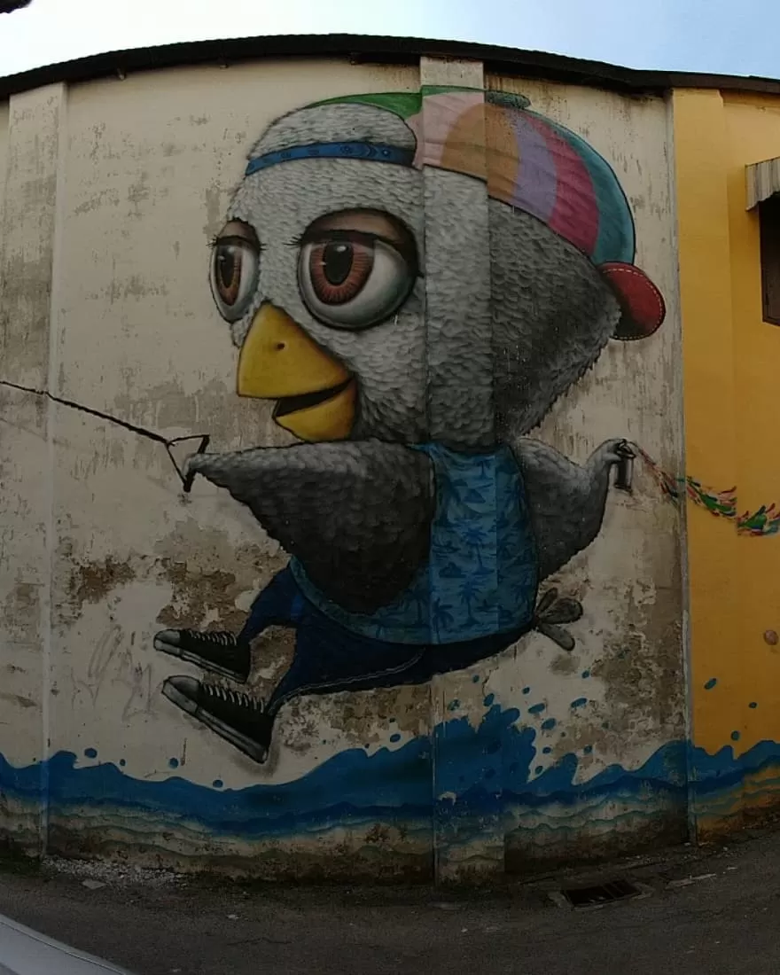 Photo of Alex Face mural graffiti @ Soi Romanee Phuket By Kolkata Nomads