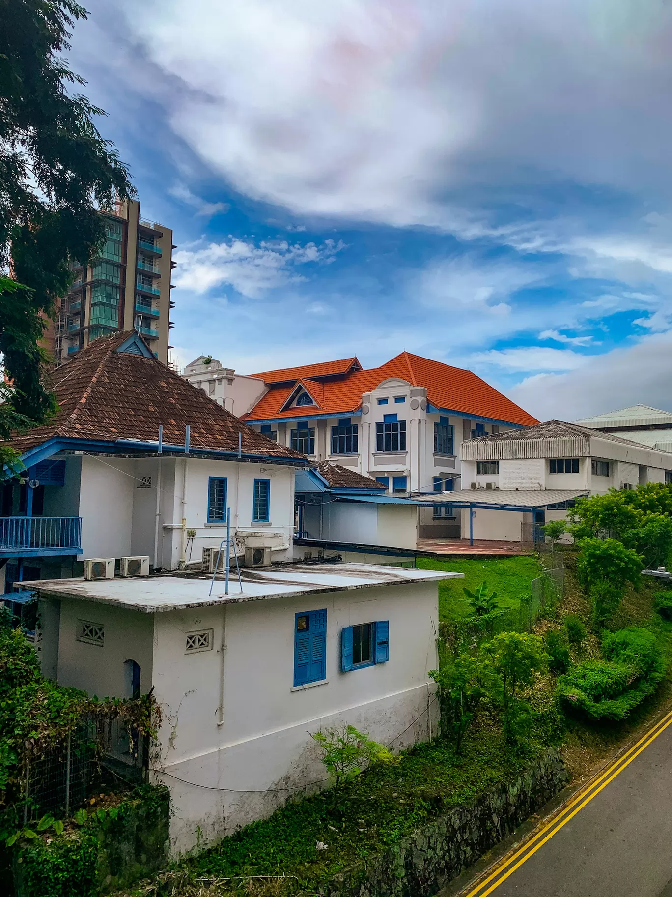 Photo of Orchard Road By Kadambari Bhatte (curlytravelmess)