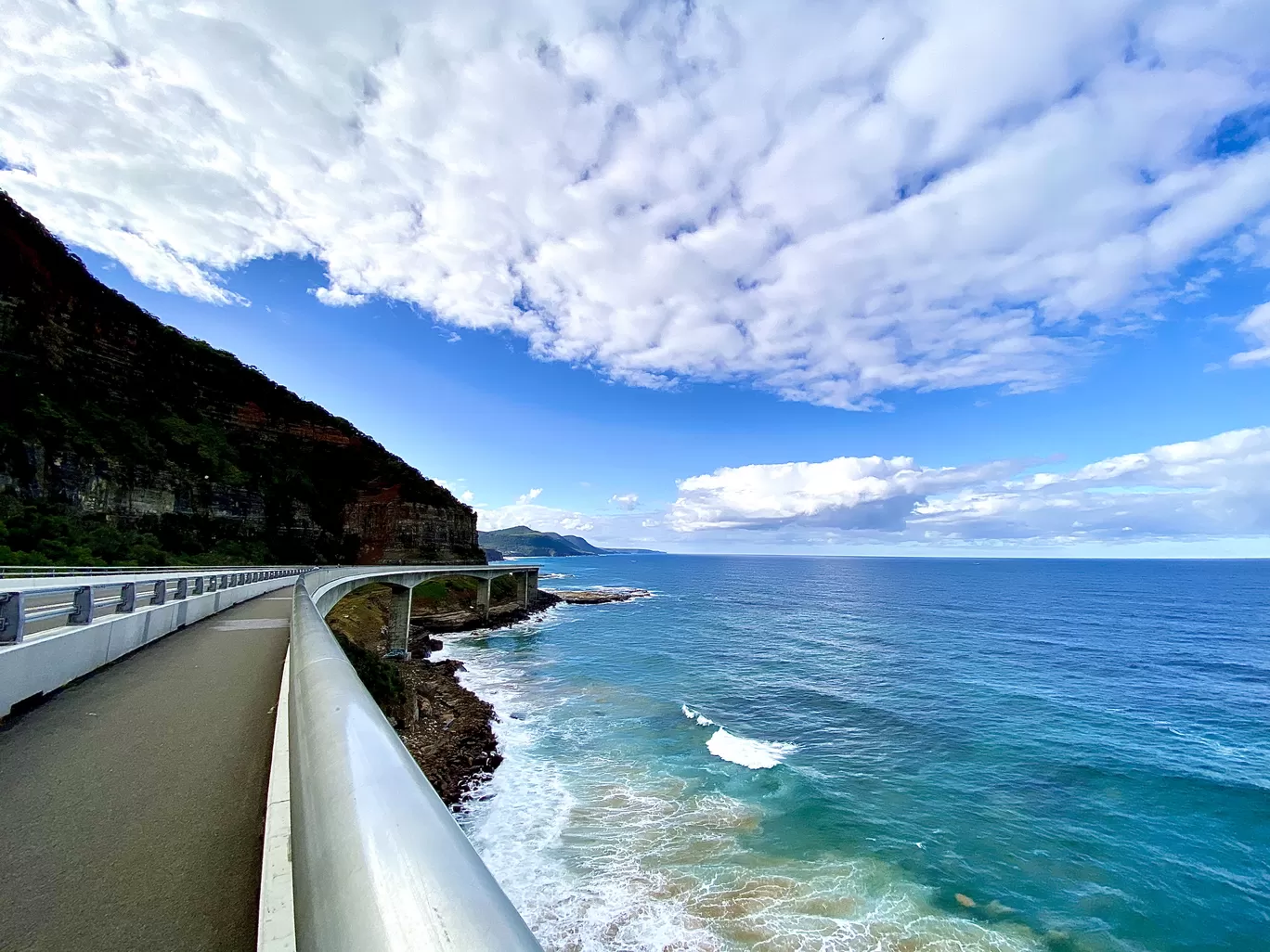 Photo of Sea Cliff Bridge By The Globetrotter Duo