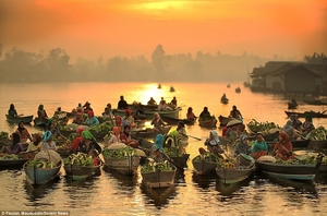 The floating markets of Indonesia with long lines of as many as 20 boats!