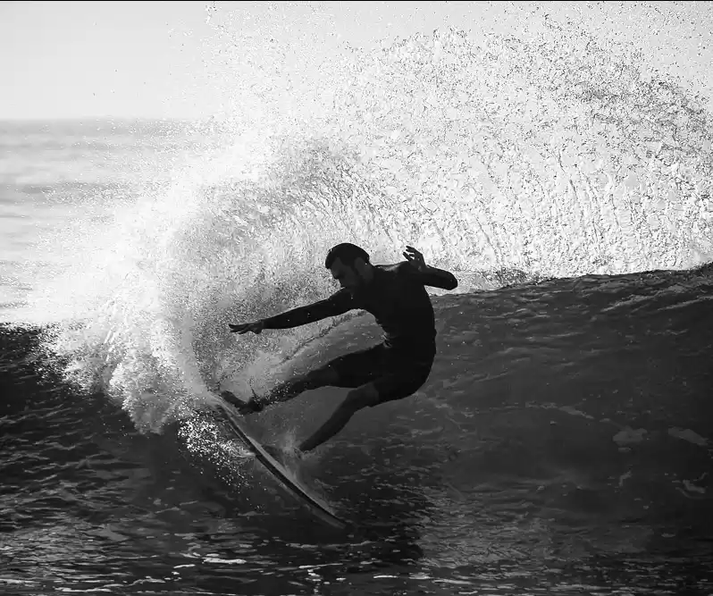 Photo of Surfer in Action