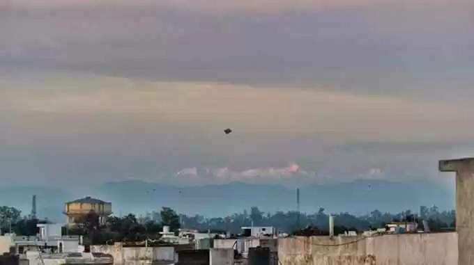 Photo of Snow-Capped Peaks of