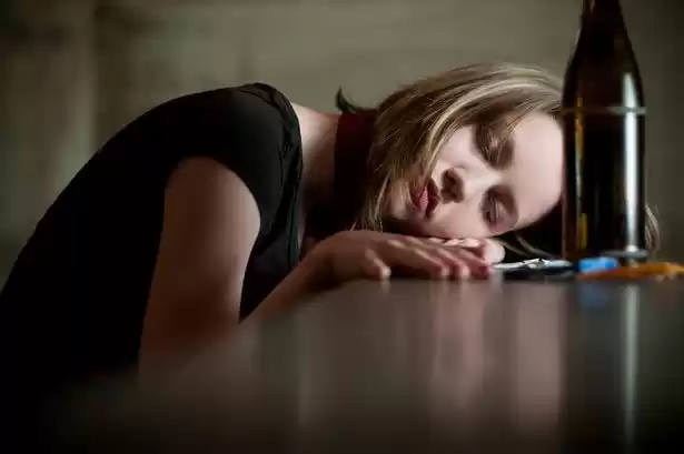 Photo of Woman Downs Entire B