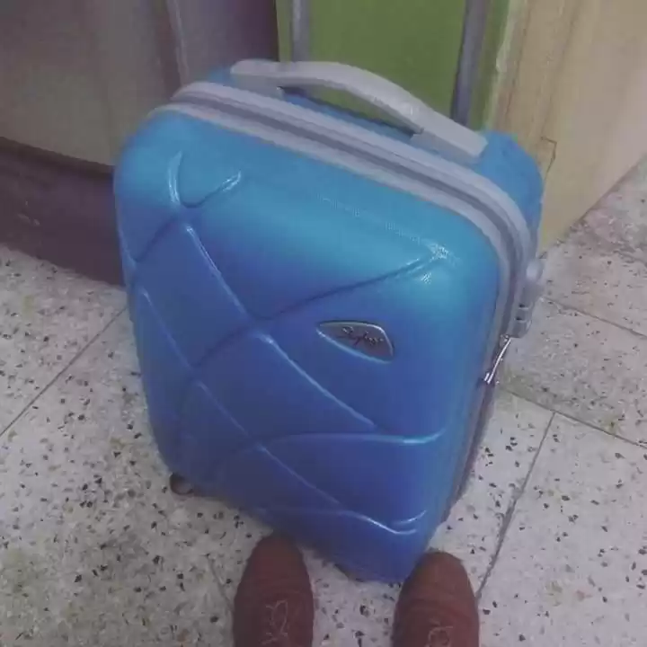 Photo of Travellers and Packe