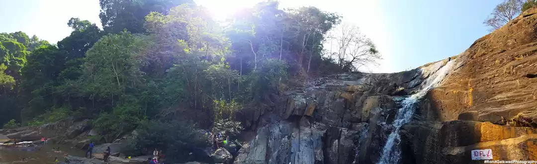 Photo of A waterfall with a s