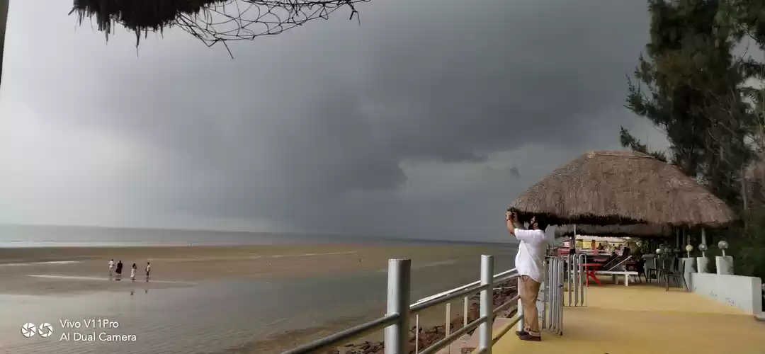 Photo of Rain Clouds Over Bea