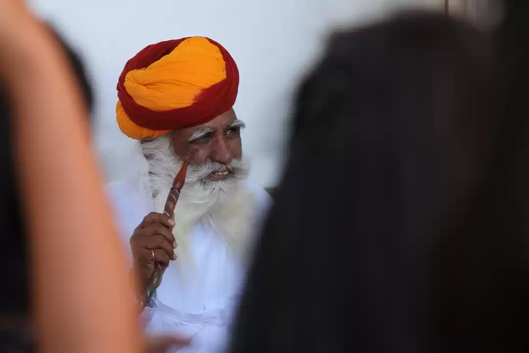 Photo of Old man with his hoo