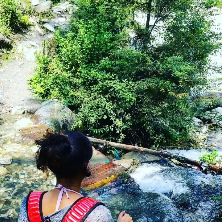 Photo of By a fierce river. 